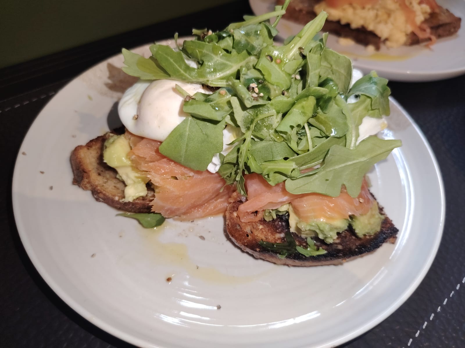 Smoked salmon, avocado and poached eggs on toast at Cosy Cafe and Kitchen